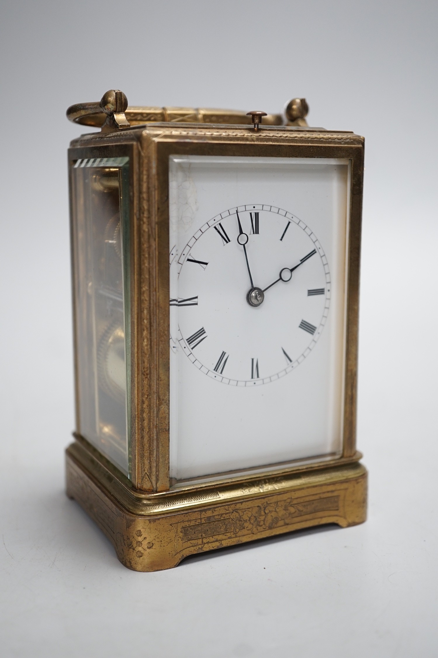 A 19th century French chased gilt brass hour-repeating carriage clock with black Roman dials and second spacers over a white dial, inscribed to movement plate Payne & Co, 163 New Bond Street, London